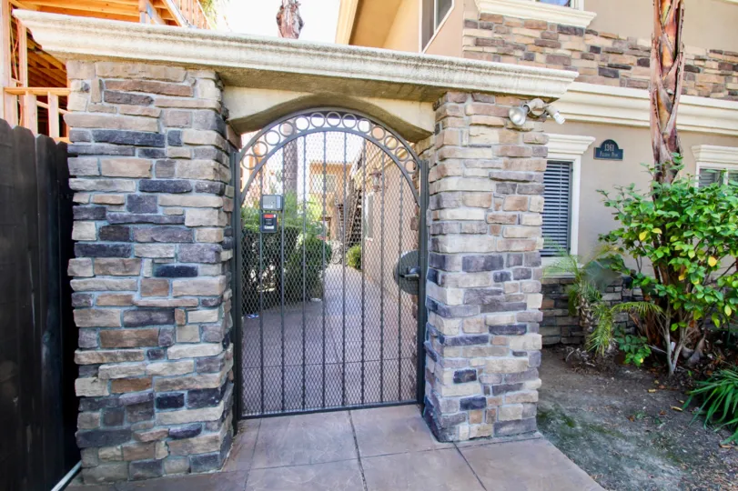 An entryway with stone cladding in the Felspar Park community.