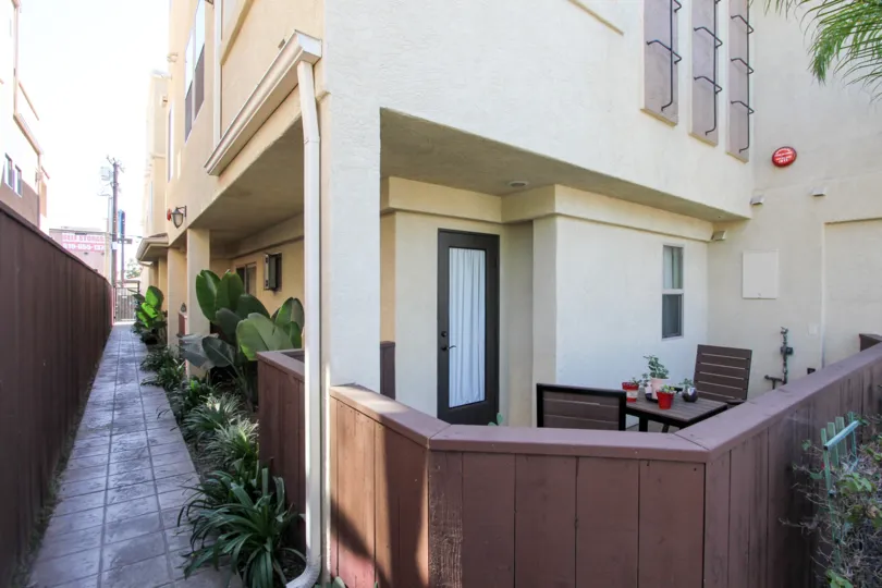 Feldspar Townhomes Creme and Brown Building with Patio Pacific Beach California