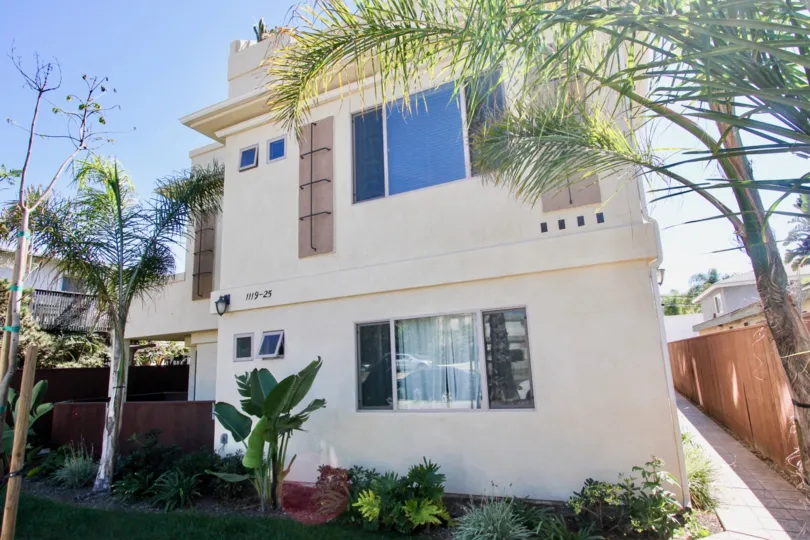 A SHINY DAY IN THE Grand Ave Townhomes WITH BEAUTIFUL house and garden