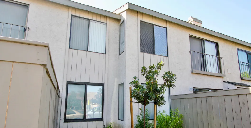A simple two-storey residence with sliding windows in La Portola community.