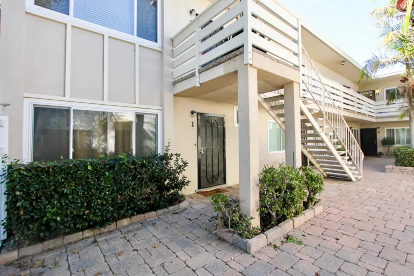 A House with spacious front end having staircase and green trees in Loring Manor of Pacific Beach