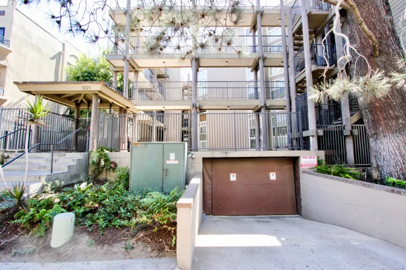 A large brown garage door on an underground parking area at Mission Bay Parker Place in Pacific Beach CA