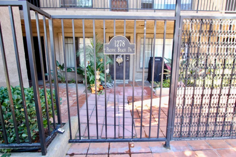 A Villa in Mission Bay Shores, In gate has a board mentioned with 1278 Pacific Beach Dr.