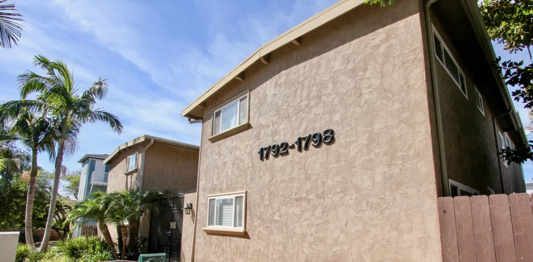 A simple two-storey residences in the Missouri Pacific community with grayish-brown color.