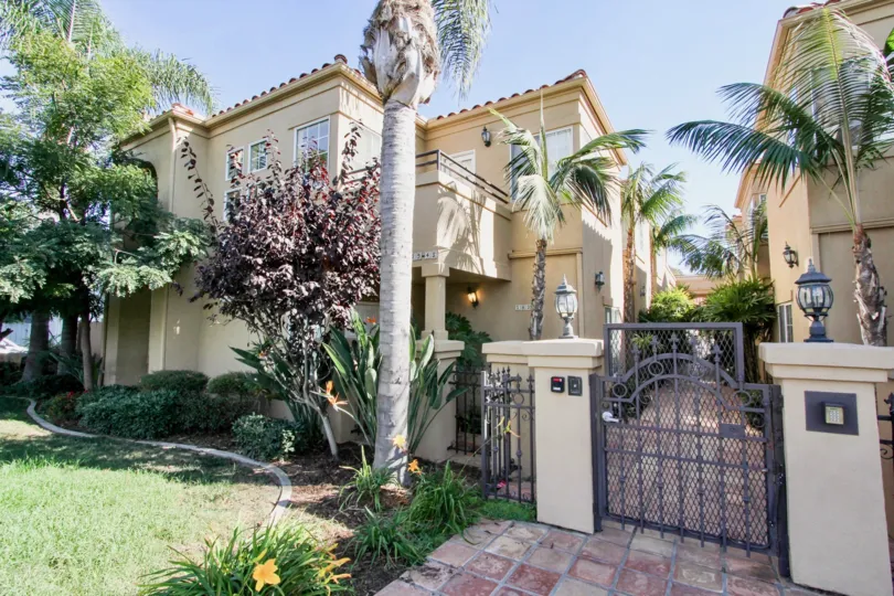 The lovely tropical setting of Missouri Street Condos with gated entrance