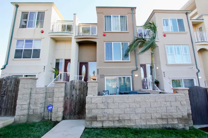 Beautiful front view and a lawn in front in North Pacific Beach Row Homes in Pacific Beach