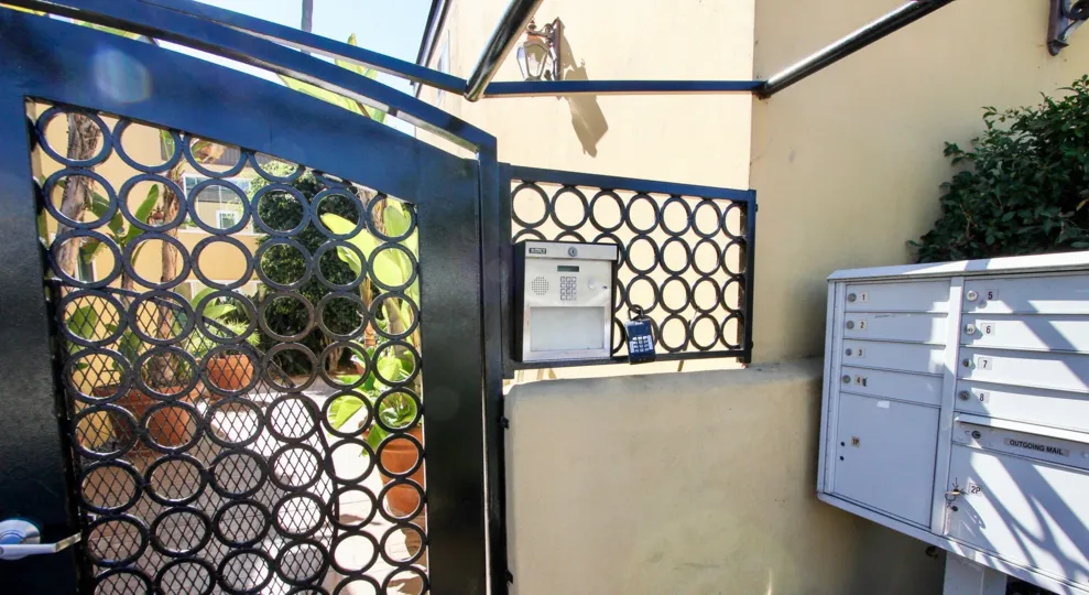 Gate and gate code box on reed Pacific Beach California