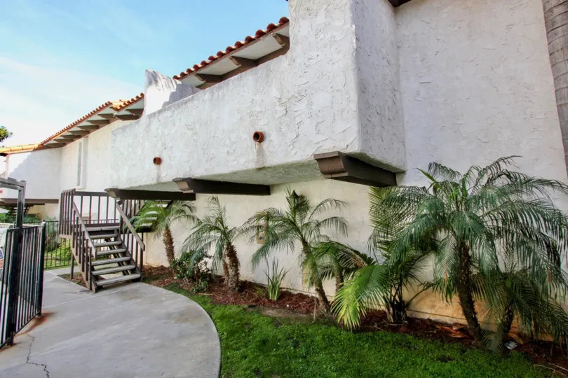 Awesome view of lawn and steps of a villa in Pacific Pines of Pacific Beach
