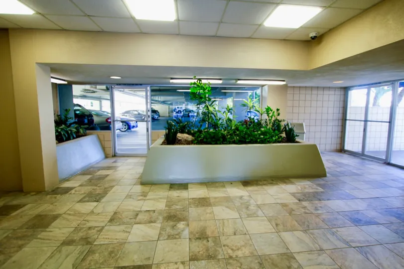 A spacious place inside a villa with lights depicted with nice flooring in Pacific Tower of Pacific Beach