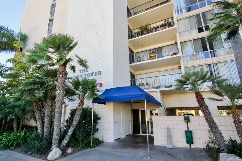 Blue awning and high-rise entryway Pacific Tower Pacific Beach California