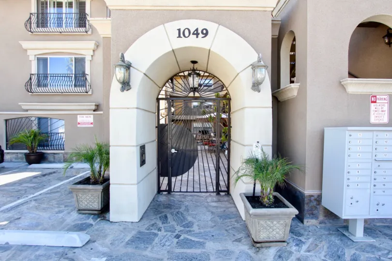 A decorative arched entryway to the Pacific Villas community.