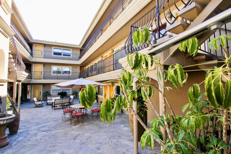 A sunny day in Pacific Villas with beautiful Grden and street