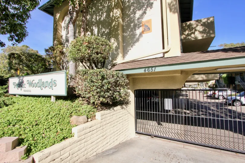THE 4651 APARTMENT IN THE PACIFIC WOODLANDS WITH THE PLANTS, CAR PARKING, TREES