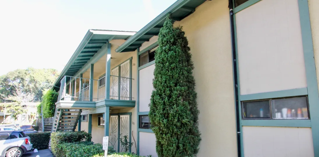 Pacific Woodlands Green and Tan Two-Story Building Pacific Beach California