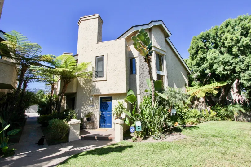 Fabulous House having greenary with lawn and trees around in Promontory Townhomes of Pacific Beach