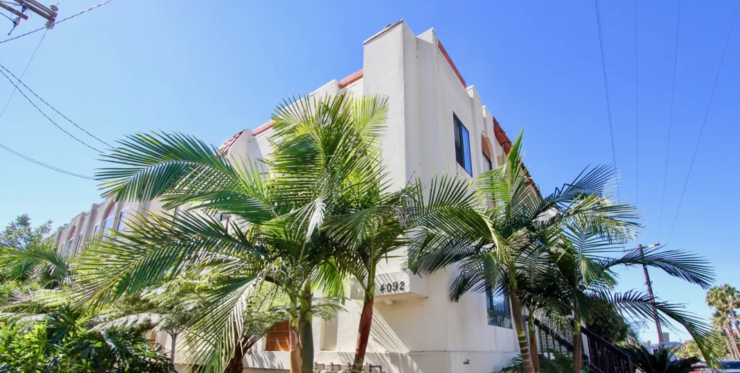 The palm trees sway in the breeze in the community of Riviera Cove in Pacific Beach CA