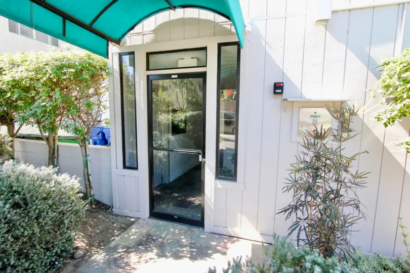 Covered entry doorway and keypad access at the Riviera Sands in Pacific Beach, California