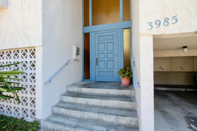 Entrance view with house number and steps in Rivieran of Pacific Bech