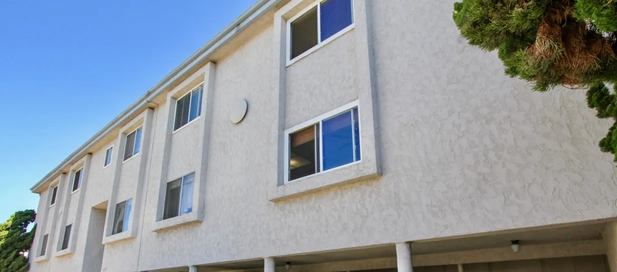 A sunny day in the area of Rivieran, outside, windows, condos, treem
