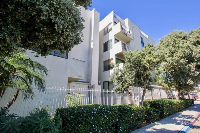 Gated sidewalk view showing the rear of San Remo, Pacific Beach, California