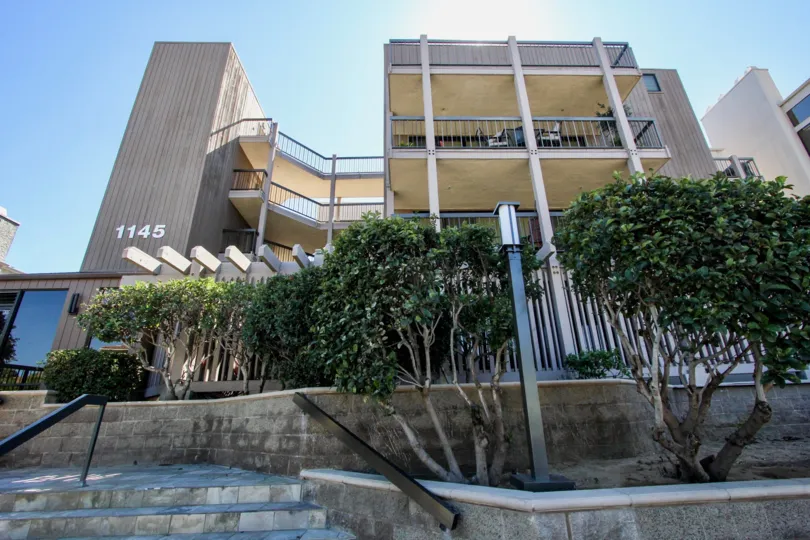 THE 1145 APARTMENT IN THE SANDERLING WITH THE UPSTAIRS, TREES, BALCONI