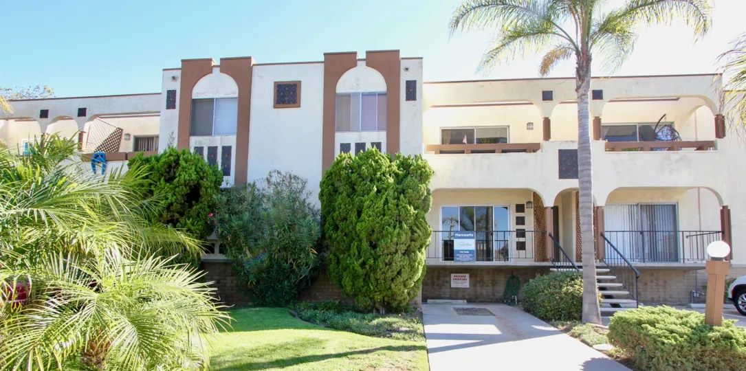 Shasta Daisy Two-Story Creme and Brown Building Pacific Beach California