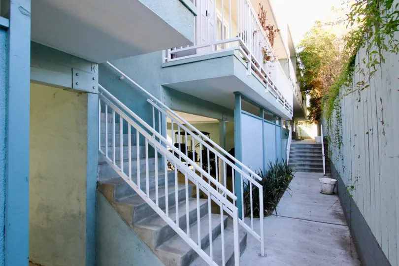 A sunny day in the area of The Heritage on Diamond, outside, sidewalk, balcon, stairsy