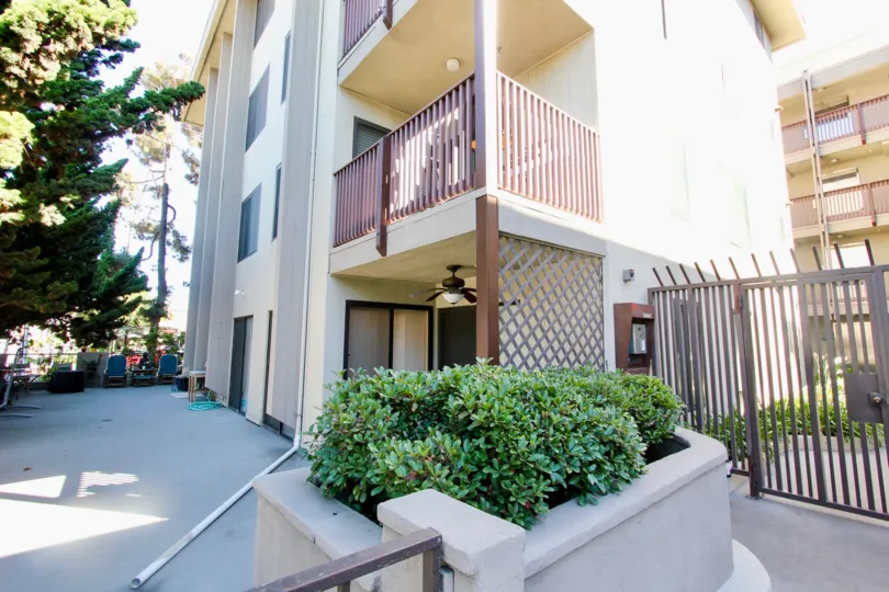 A corner view of a residence with a latticed wall in the Turramurra Condominiums community.