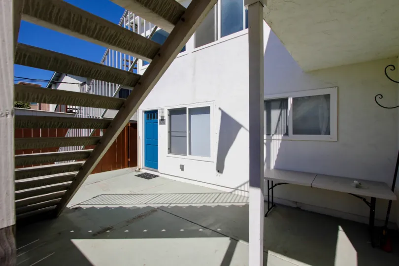 A sunny day in the Utopia with residential apartment and stairs.