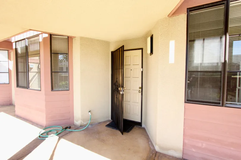 The front entrance next to large windows at one of the properties at Addison Street.