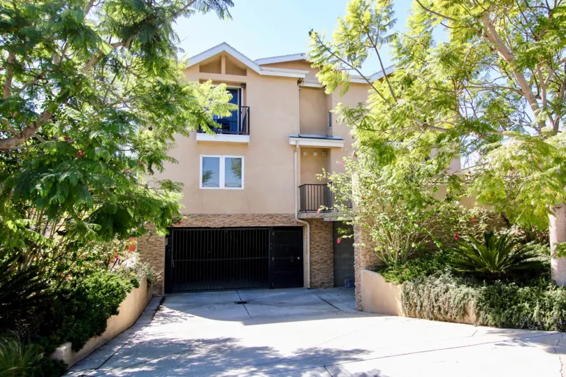 Beautiful greenery frames this Three story Condo in the Keats Condos Community, Point Loma, CA