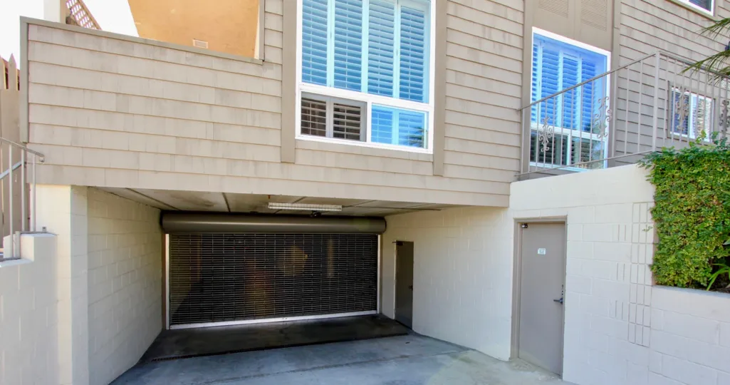 caged garage with a slope in the La Playa Bayshore Community