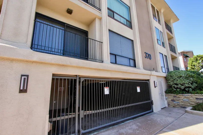 A beautiful two story condo with a balcony view with a attached underground garag