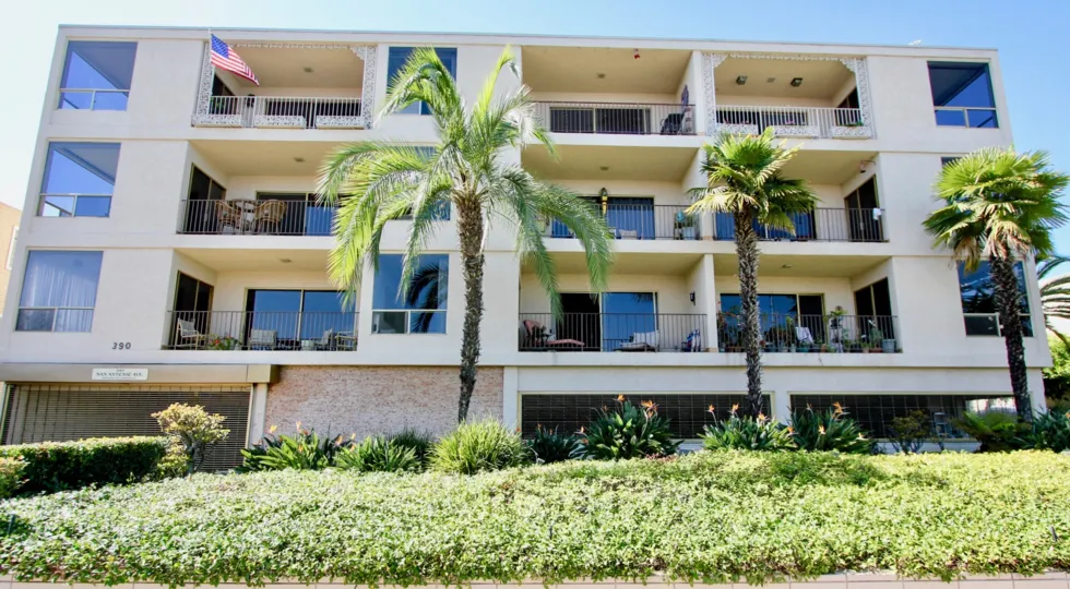 the Balconies and palm trees of Park La Playa in Point Loma