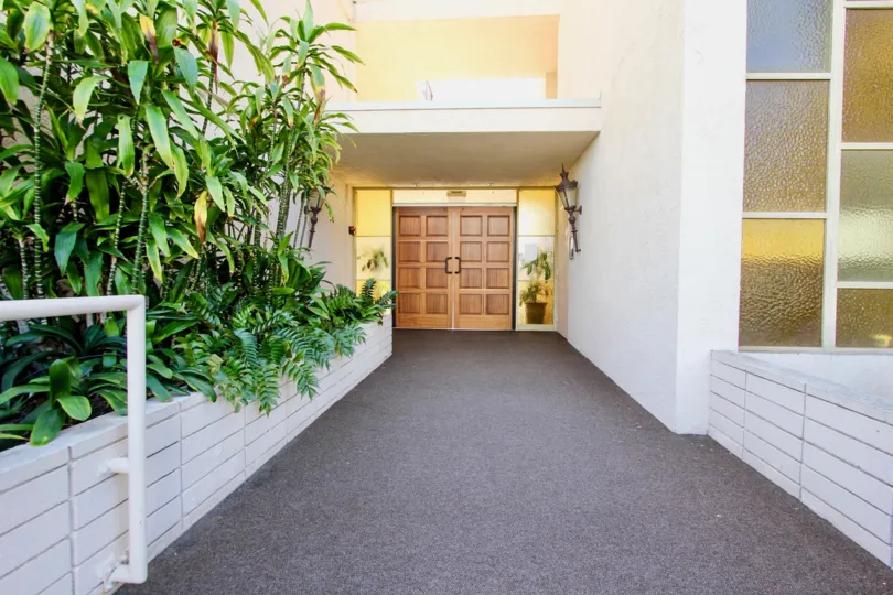 Double doors open up to the walkway in this Point Loma unit.