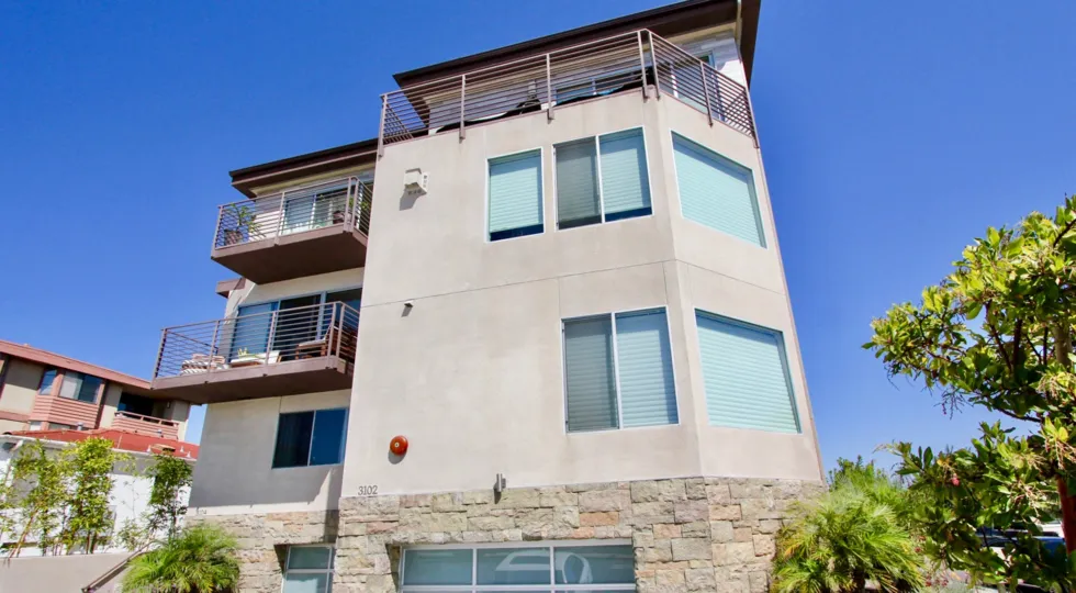 Looking up at the large balconies at the Portugal Place Community in Point Loma, CA