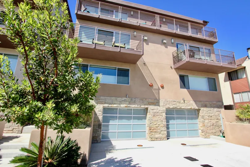 A sunny exterior shot of the Portugal Palace apartment Complex