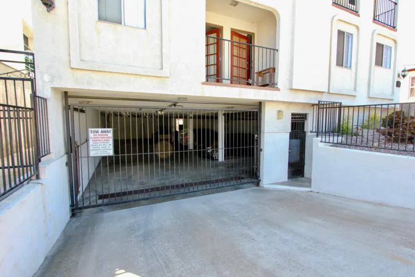 The garage driveway and gate to the parkade of an apartment complex at Primrose Gardens in Point Loma, California