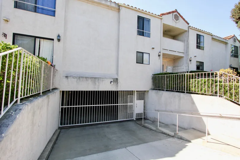 Underground parking with gated access and safety railings at the Roseville Terrace