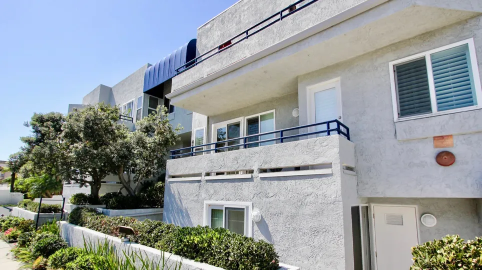 A sunny day in the area of Vista La Playa, outside, trees, bushes, balcony, window, door