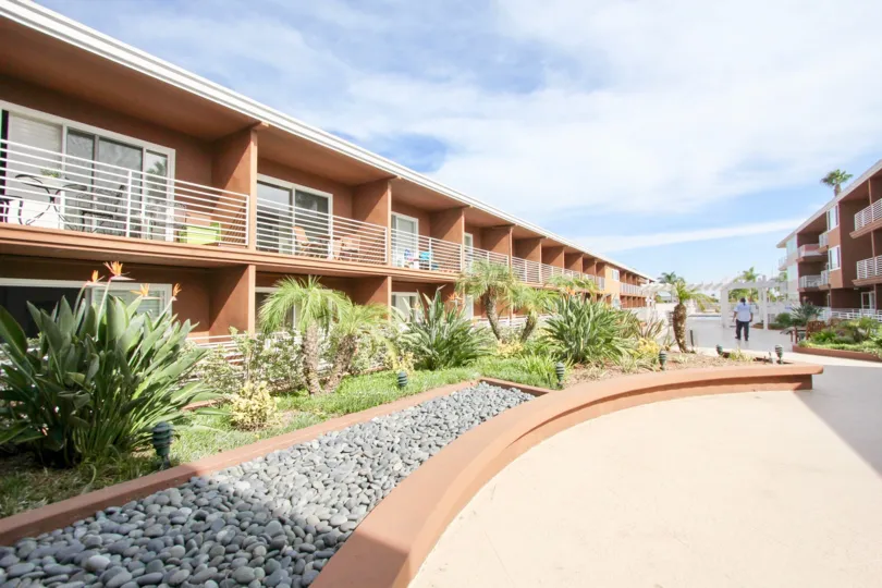 A view of the parking lot to condos in the Yacht Club Condos community.