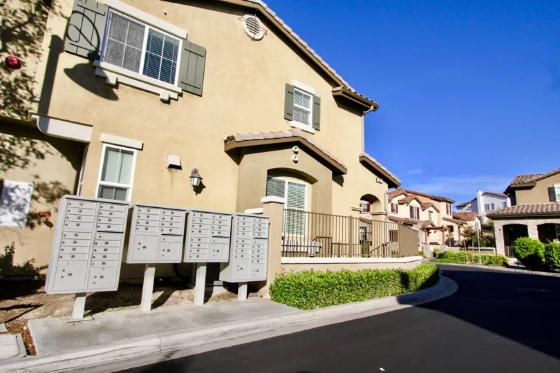 The view from the road, showing the community mailboxes, at Amante Ravenna in the city of Rancho Bernardo, California.