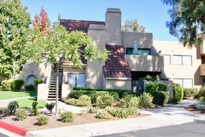 Three story residence with chimney at Bernardo Pines in Rancho Bernardo CA