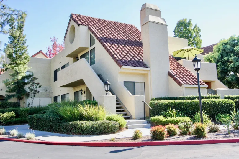 Two story condominiums with slanted roof at Bernardo Pines IN Rancho Bernardo CA