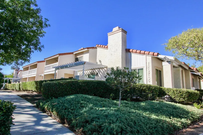 Residential buildings near plants and trees at Bernardo Terrace in Rancho Bernardo California