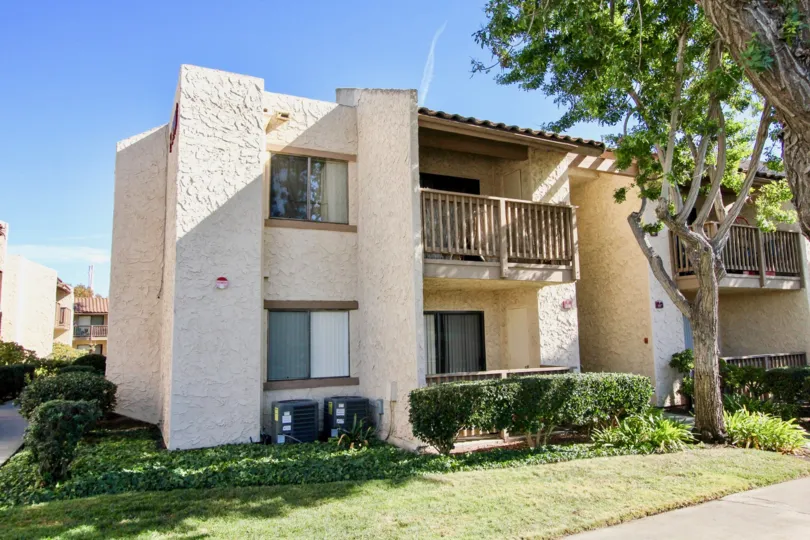 Two story housing with a tree at Bernardo Terrace in Rancho Bernardo CA