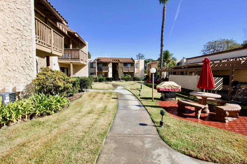 Picnic area in a yard near a residential building at Bernardo Terrace in Rancho Bernardo CA