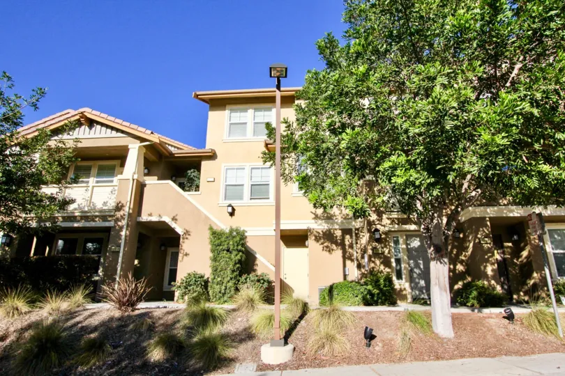 Three story residential building with yard at Bridgeport in Rancho Bernardo California