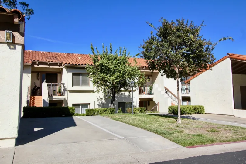 Two story town homes with trees and yard at Campana Villas in Rancho Bernardo CA
