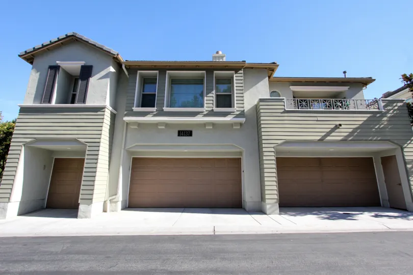 a two storied house with two garage an two entrance at Cypress Greens. Rancho Bernardo at California